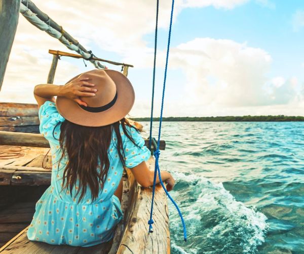 woman on sailboat being present